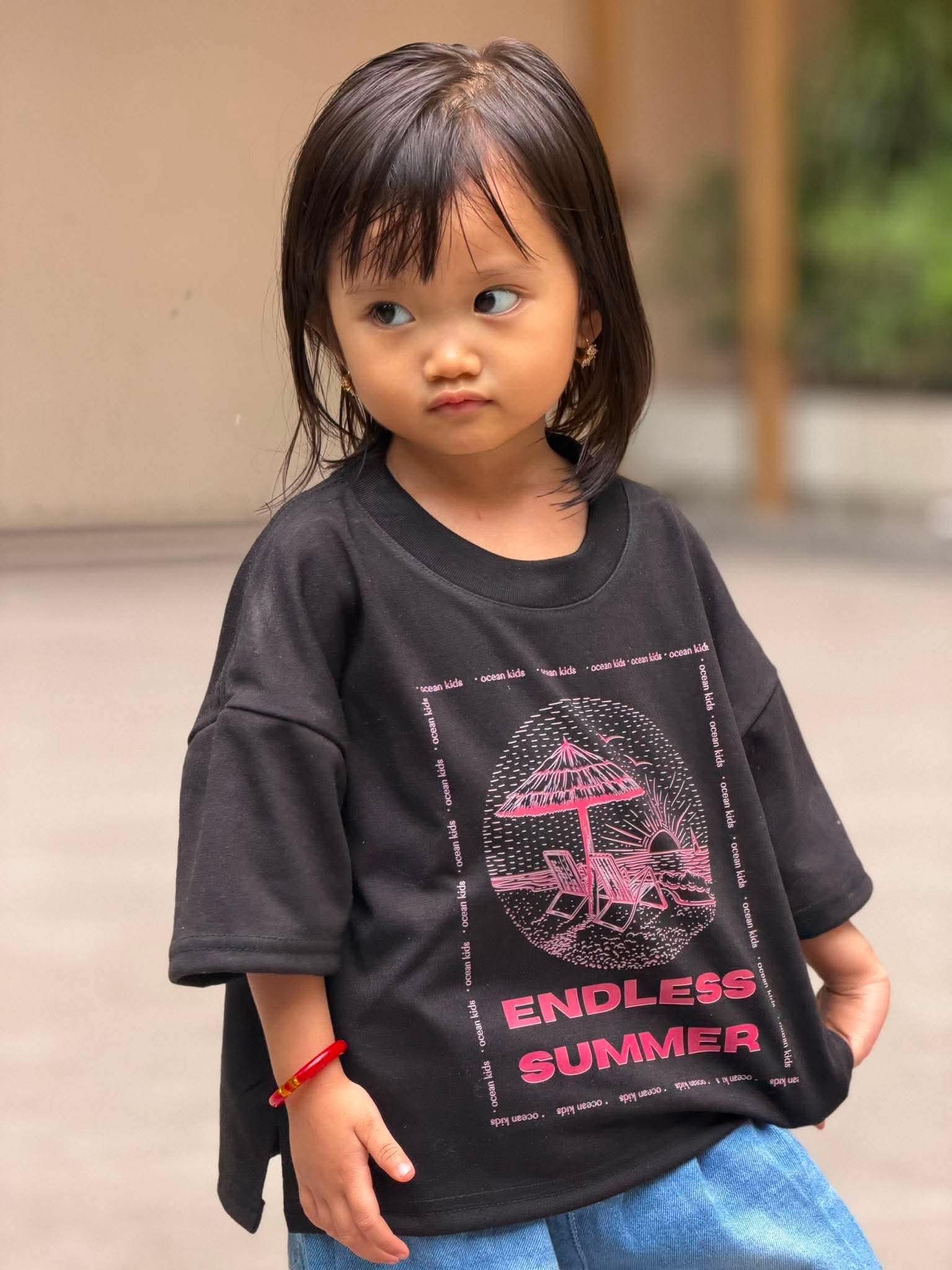 Ocean Kids model in Endless Summer Tee