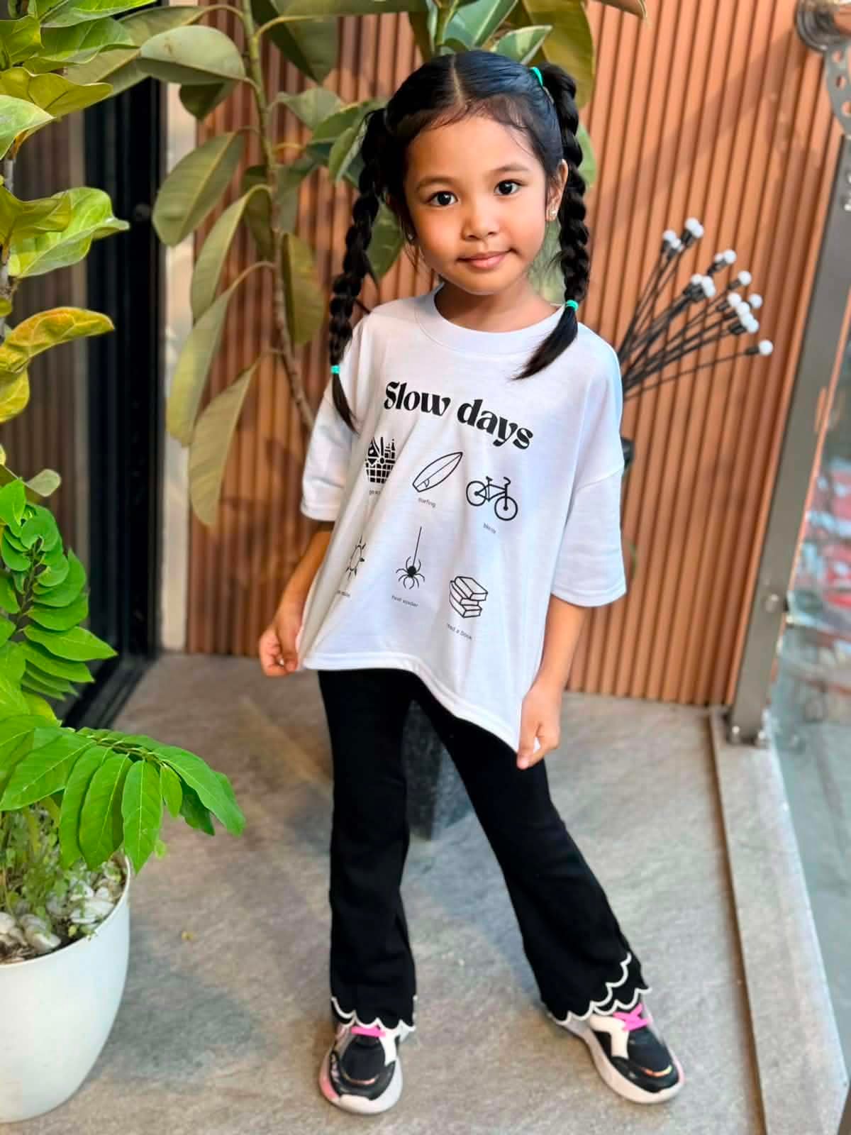Ocean Kids model in Slow Days Tee
