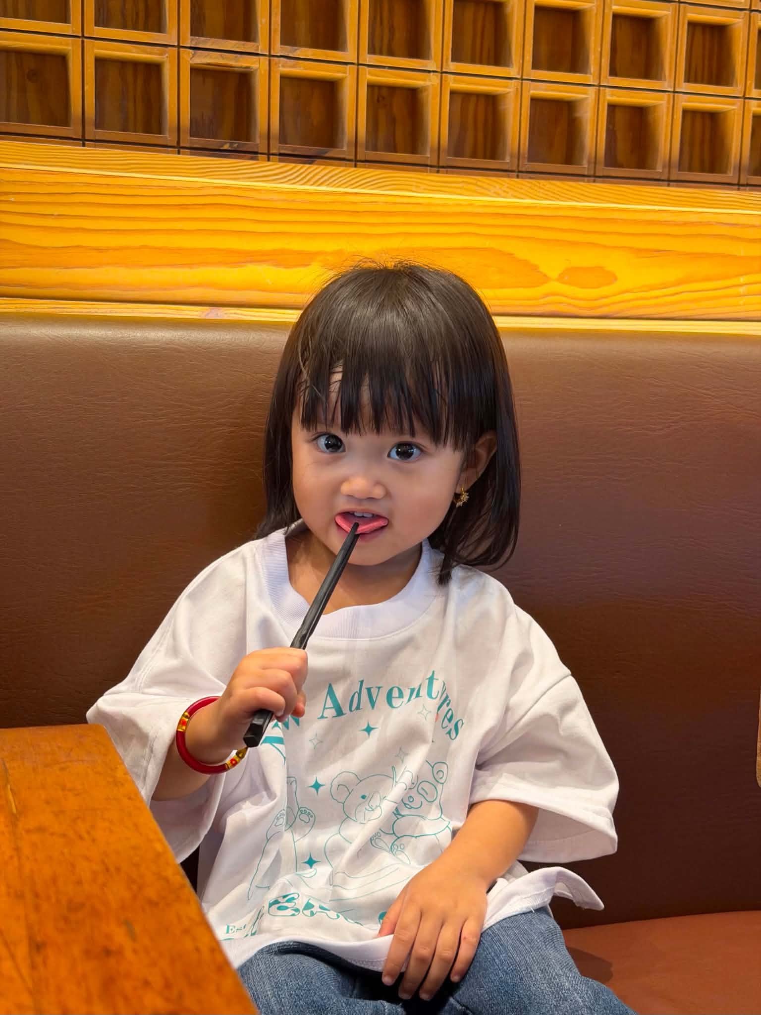 Ocean Kids model in New Adventures Tee